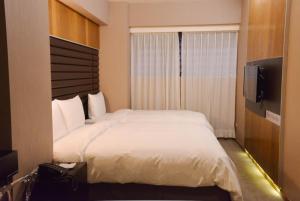 新麗旅店 Newful Hotel TV 또는 엔터테인먼트 센터