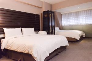 新麗旅店 Newful Hotel 객실 침대