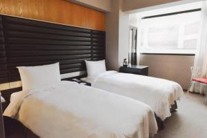 新麗旅店 Newful Hotel 객실 침대