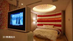 TV a/nebo společenská místnost v ubytování Chimei Fashion Hotel