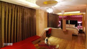 TV a/nebo společenská místnost v ubytování Chimei Fashion Hotel
