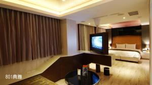 TV a/nebo společenská místnost v ubytování Chimei Fashion Hotel