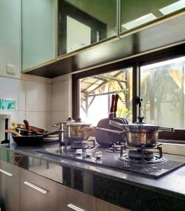 Gallery image of Cheery Room 202 in Surabaya +34 photos