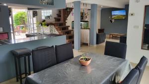 a table with a potted plant sitting on top of it at Casa con piscina y jacuzzi en santa clara del mar in Santa Clara del Mar