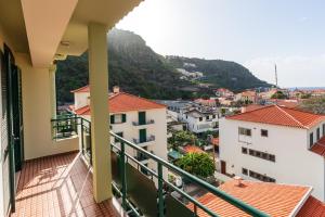 a view from a balcony of a city at Bela Vale Nº4 in Ribeira Brava