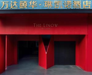 un edificio rosso con un cartello che legge il suono di Wanda Yi, Xi'an The Linow a Xi'an