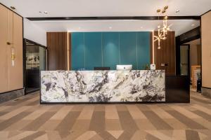 Preddverje oz. recepcija v nastanitvi Yunmu International Administrative Mansion Chongqing Nanbin Road Himalaya Branch