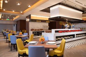 מסעדה או מקום אחר לאכול בו ב-Hampton by Hilton Changsha Wuyi Square