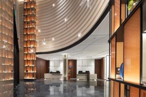 אזור ישיבה ב-Hampton by Hilton Changsha Wuyi Square