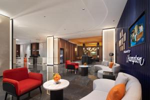 אזור ישיבה ב-Hampton by Hilton Changsha Wuyi Square
