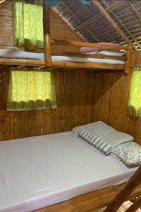 Postel nebo postele na pokoji v ubytování PAPABO Adventure Village