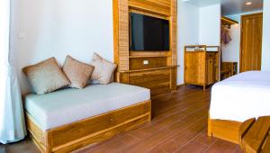 Ein Bett oder Betten in einem Zimmer der Unterkunft Phi Phi at Pier