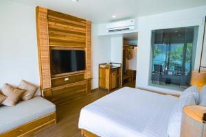 Ein Bett oder Betten in einem Zimmer der Unterkunft Phi Phi at Pier