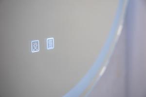 a clock on the side of a building at Stylish Studio with Great Ocean Views & Near Beach! in Honolulu
