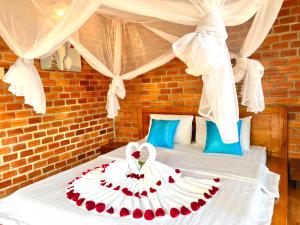 Giường trong phòng chung tại An Yen Resort +49 ảnh