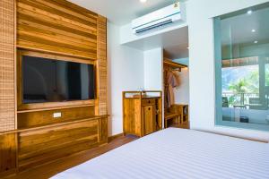 Ein Bett oder Betten in einem Zimmer der Unterkunft Phi Phi at Pier
