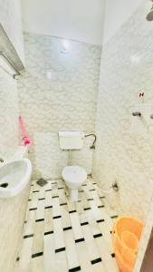 Koupelna v ubytování Hotel White House - A Family Homestay