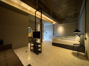Giường trong phòng chung tại M2 Living Townhouse in Ipoh