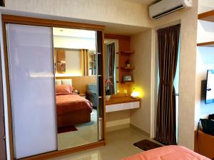 En eller flere senge i et værelse på Algan Rooms