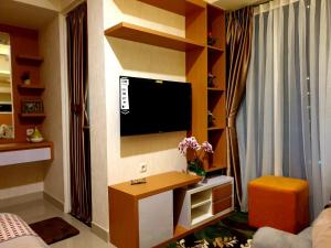 Et tv og/eller underholdning på Algan Rooms