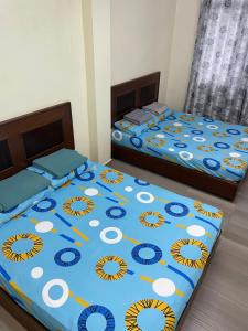 Postel nebo postele na pokoji v ubytování KB Guesthouse