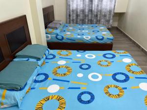 Postel nebo postele na pokoji v ubytování KB Guesthouse