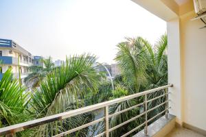 Balkón nebo terasa v ubytování FabHotel Palm Paradise
