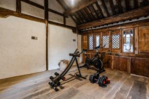 O centro de fitness e/ou as comodidades de fitness de 墨弦苑智能轻奢民宿 喜洲镇海舌公园店