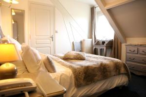 Postel nebo postele na pokoji v ubytování Cit'Hotel La Villa Julia