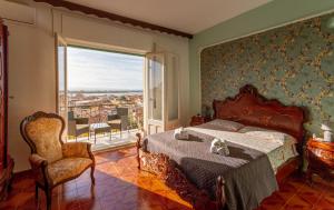 Postel nebo postele na pokoji v ubytování Carloforte Appartamento con Vista IUN R2015