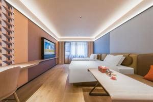 Khu vực ghế ngồi tại Orange Hotel Guilin Yangshuo West Street Branch