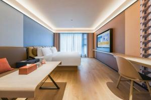 TV/trung tâm giải trí tại Orange Hotel Guilin Yangshuo West Street Branch