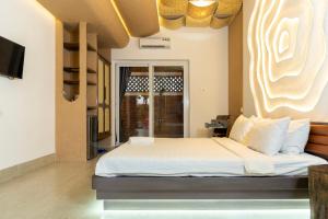 Postel nebo postele na pokoji v ubytování The Thousand Village - Mũi Né + 42 fotografií