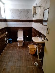 Koupelna v ubytování Aishwaryam home stay