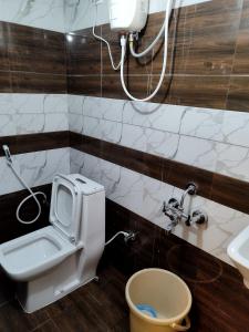 Koupelna v ubytování Aishwaryam home stay
