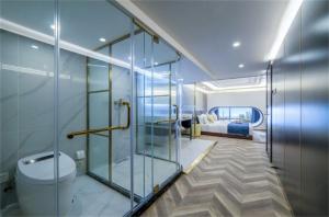 Koupelna v ubytování Yunmulijin Sky High Riverview Hotel Chongqing Jiefangbei Raffles Plaza