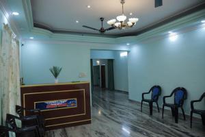 a meeting room with chairs and a podium at sarangvilla homestay varkala,edava in Kappil