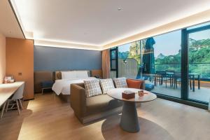 Khu vực ghế ngồi tại Orange Hotel Guilin Yangshuo West Street Branch