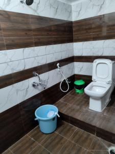 Koupelna v ubytování Aishwaryam home stay