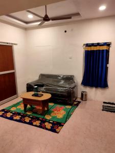 Posezení v ubytování Aishwaryam home stay