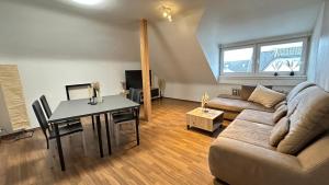Posezení v ubytování Rooftop Apartment - 3 SZ - 1 BAD - 1 WZ - 1 Küche + 33 fotografií