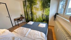 Postel nebo postele na pokoji v ubytování Rooftop Apartment - 3 SZ - 1 BAD - 1 WZ - 1 Küche