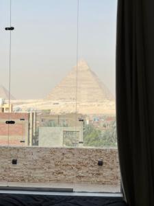 Foto dalla galleria di Love pyramids view a Il Cairo