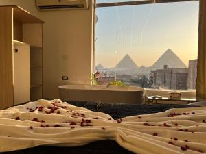 Foto dalla galleria di Love pyramids view a Il Cairo