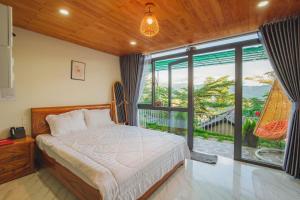 Voodi või voodid majutusasutuse Khu Nghỉ Dưỡng View Triệu Mây toas