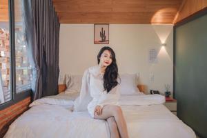 Voodi või voodid majutusasutuse Khu Nghỉ Dưỡng View Triệu Mây toas
