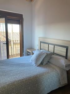 Postel nebo postele na pokoji v ubytování Casa Capricho