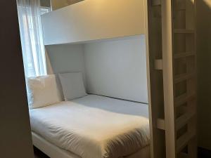 Postel nebo postele na pokoji v ubytování greet hotel Lille Gare Flandres - Groupe Accor