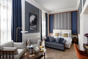 Ein Sitzbereich in der Unterkunft Hôtel Métropole Genève