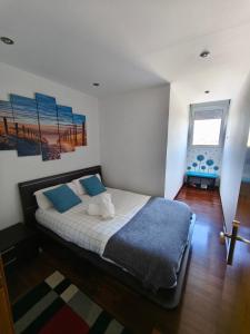 A bed or beds in a room at Dúplex Surf junto a la playa
